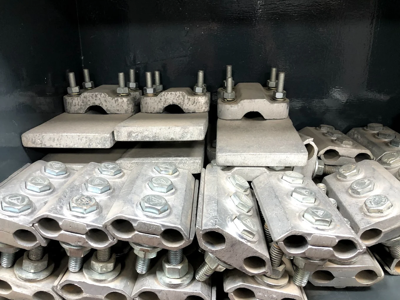Stock of bolted electrical connector clamps