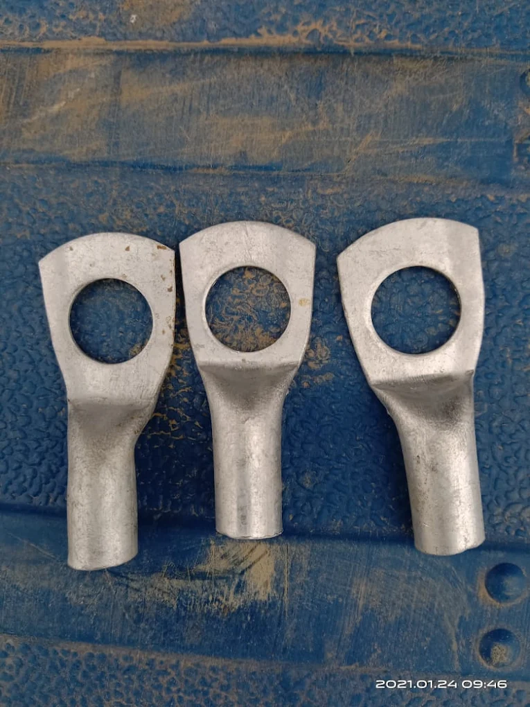 Three heavy-duty electrical cable lugs